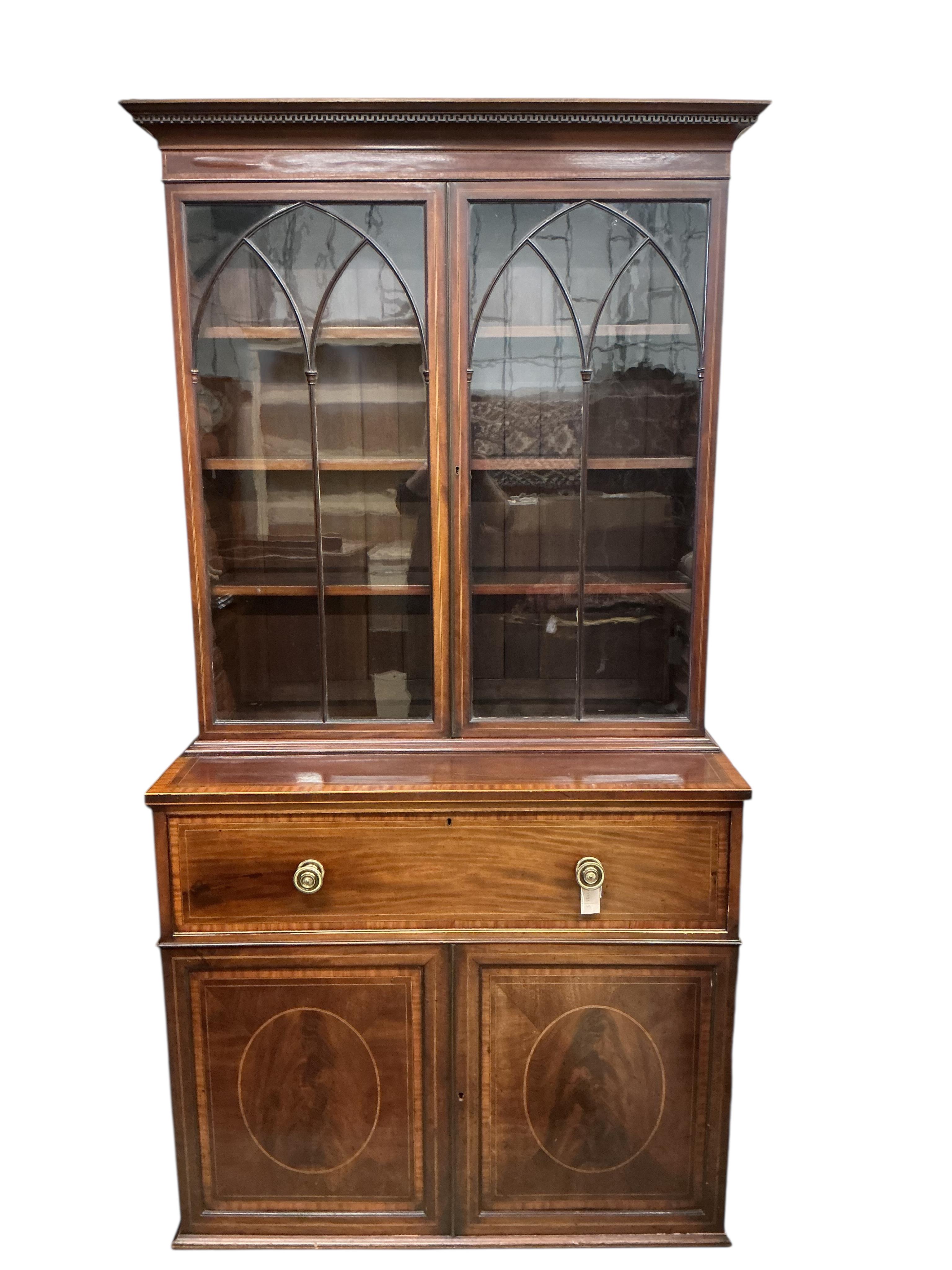 A George IV satinwood banded mahogany secretaire bookcase, width 104cm, depth 54cm, height 212cm